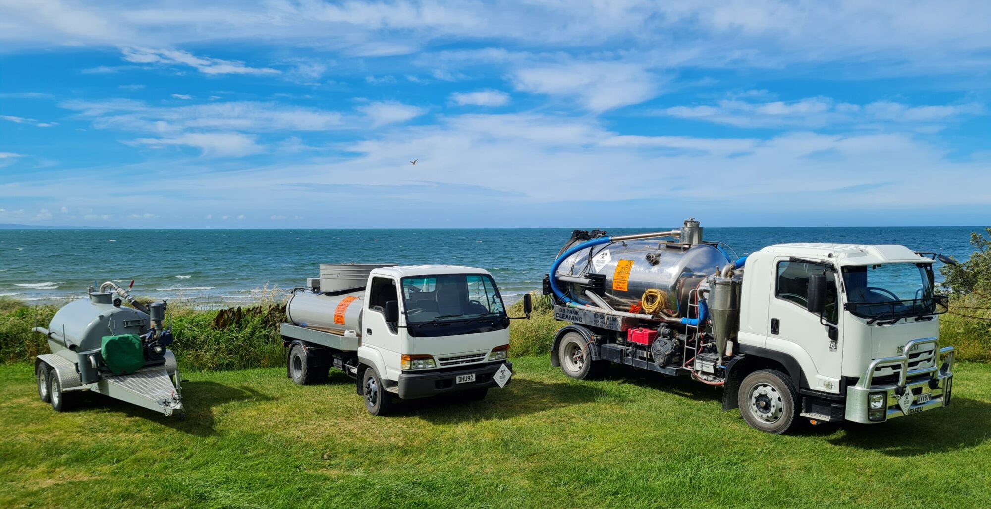 Golden Bay Tank Cleaning trucks and equipment lined up for service